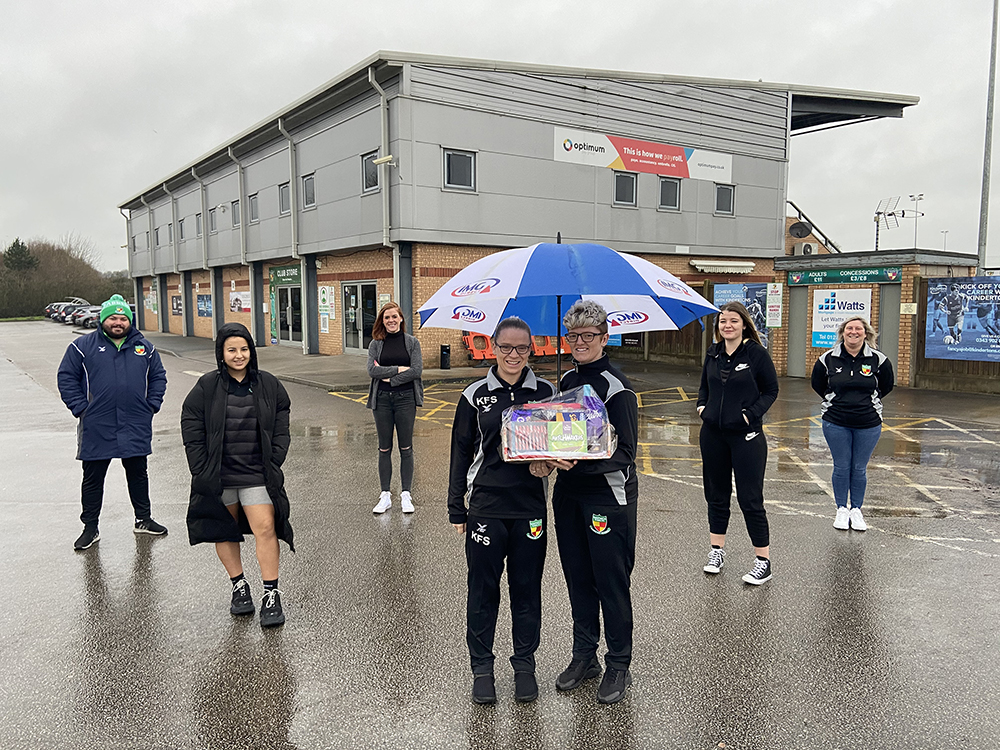 Nantwich Town Ladies FC setup and distribute Christmas food hampers
